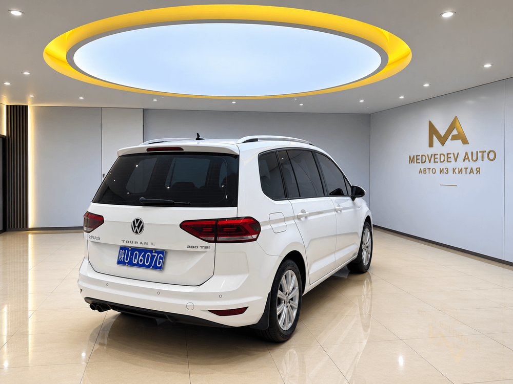 Volkswagen TOURAN  L фото 3
