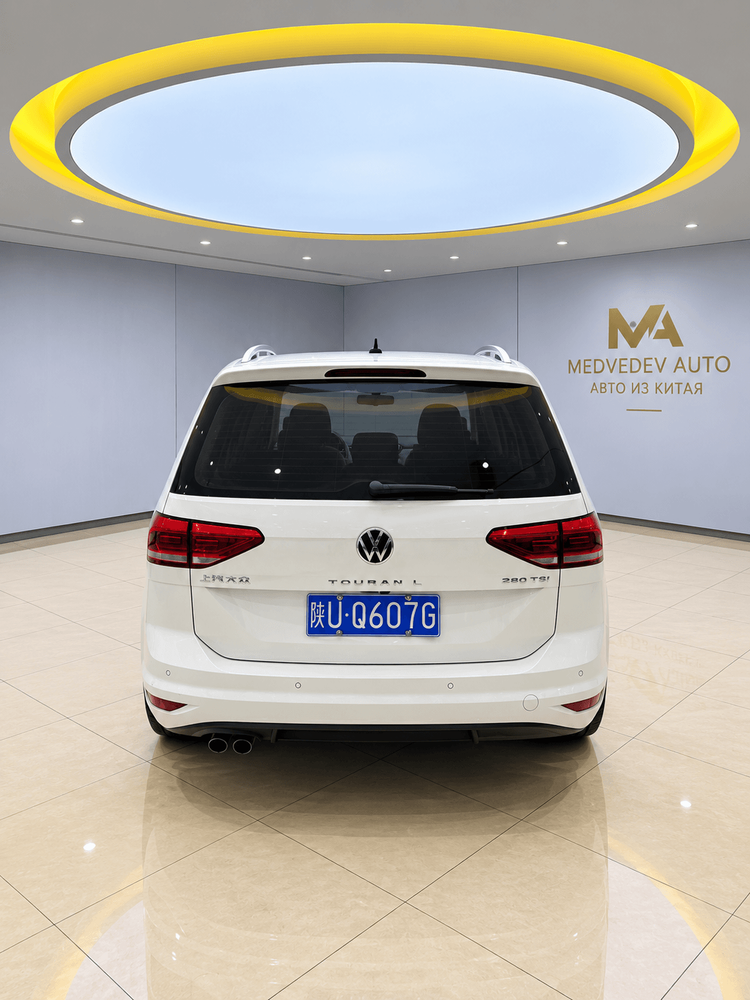 Volkswagen TOURAN  L фото 4